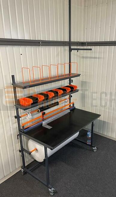 Stół do pakowania z regulacją wysokości blatu 70 - 120 cm