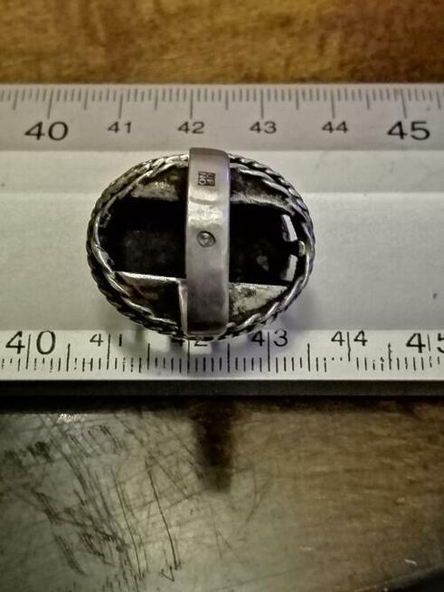 1.	Pierścionek ORNO z kamieniem zielonym, sygnowany