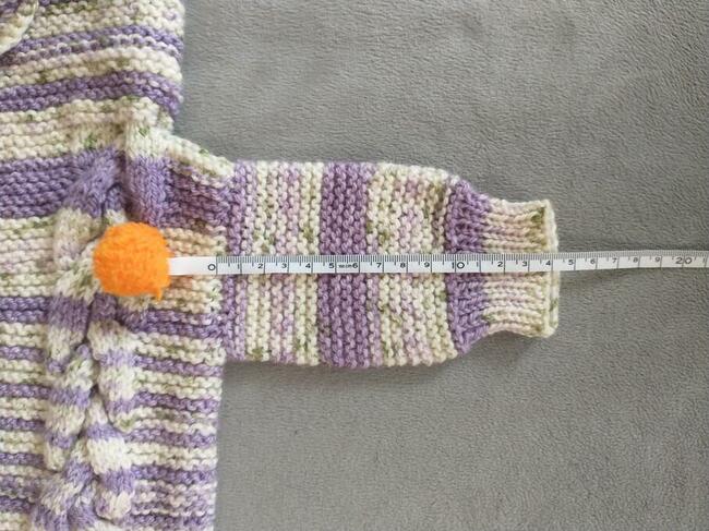 Ręcznie robiony kombinezon niemowlęcy z kapturem - eskimosik