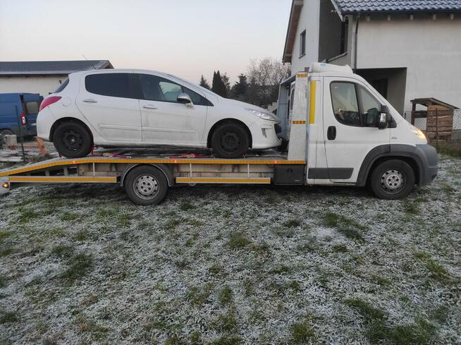 Pomoc Drogowa Leszno tania laweta od 100 zł 24/7 Rydzyna,