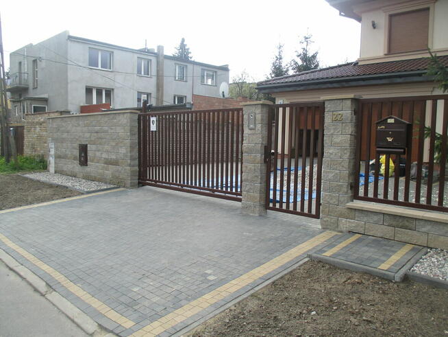 Ogrodzenia murowane bloczek gładki / łupany -budowa ogrodzeń