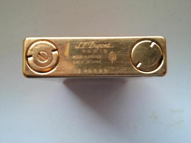 Złota zapalniczka ST Dupont Francja gratis but Finlandii