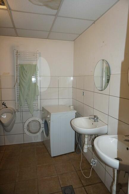 Hala magazynowo-produkcyjna z biurami, ogrzewanie.