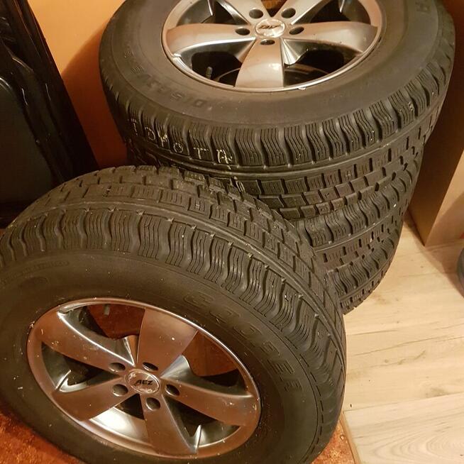 opony zimowe na felgach alu.