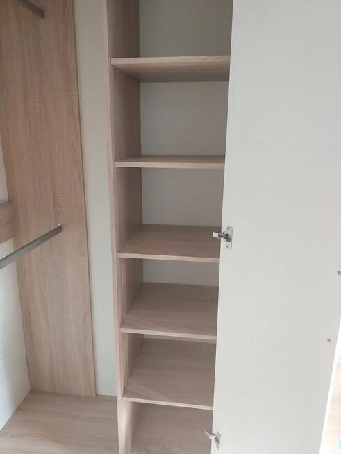 Szafa narożnikowa i regał