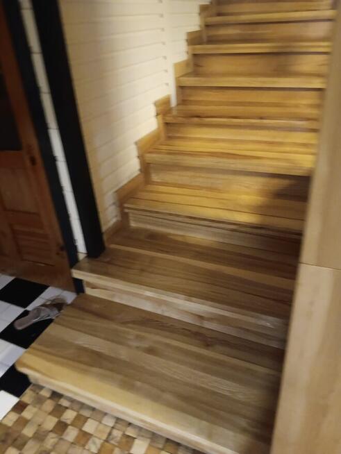 Układanie paneli podłóg parkietu cyklinowanie lakierowanie w