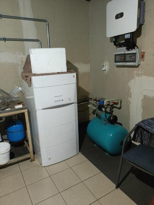 Dom wolnostojący z garażami oraz samo