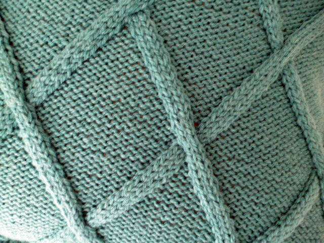 Dekoracyjna poszewka na poduszeczkę.