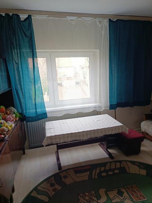 zamienię pół domu na mieszkanie