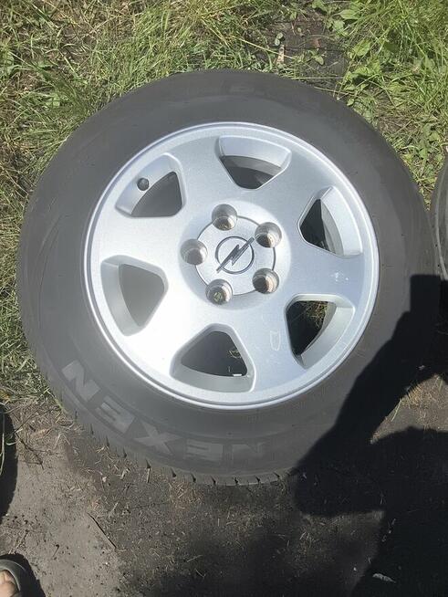 Felgi z oponami opel.