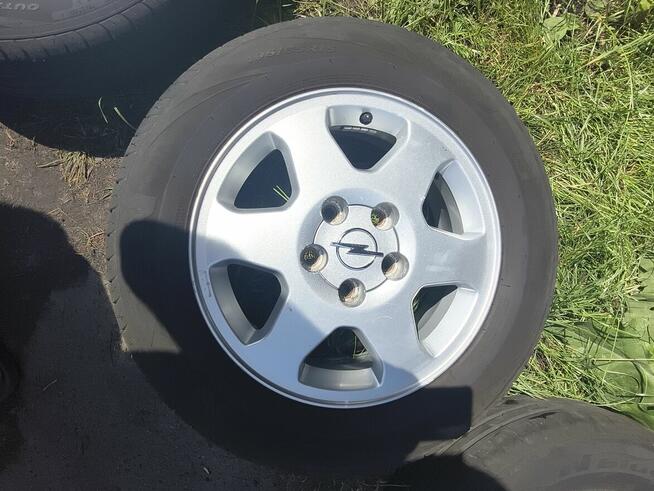 Felgi z oponami opel.