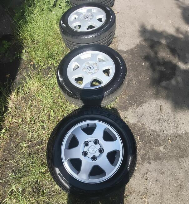 Felgi z oponami opel.