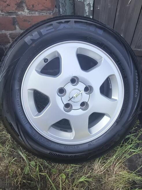 Felgi z oponami opel.