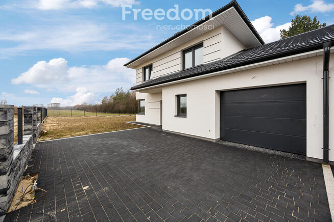 Bliźniak z garażem na kameralnym osiedlu