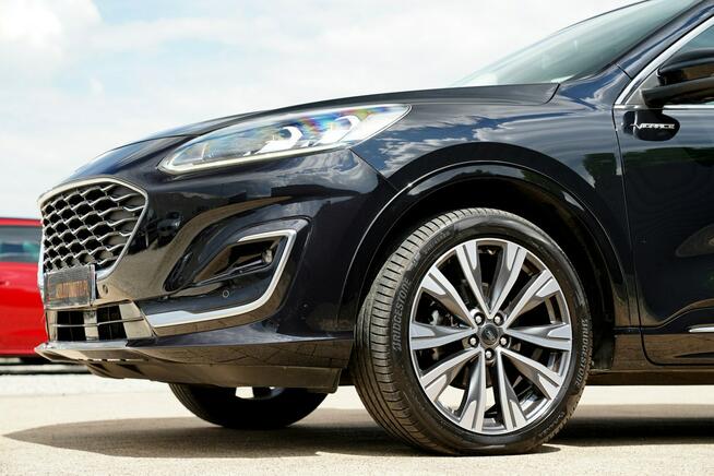 Ford Kuga VIGNALE skóra Nawi FUL LED el.klapa ACC 4x4 B&Q grzane fotele i kanapa
