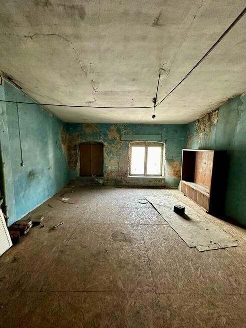 Kawalerka do Remontu na 4 piętrze - PLAC WOLNOŚCI