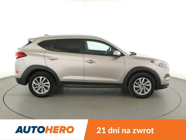 Hyundai Tucson navi klima auto grzane fotele kamera i czujniki parkowania