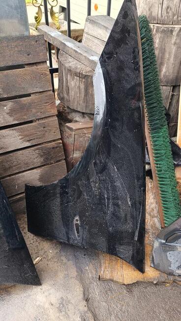 blotnik lewy przod BMW e91 330d 2011 lift