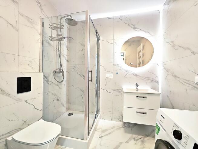 Nowy apartament z balkonem oraz garażem