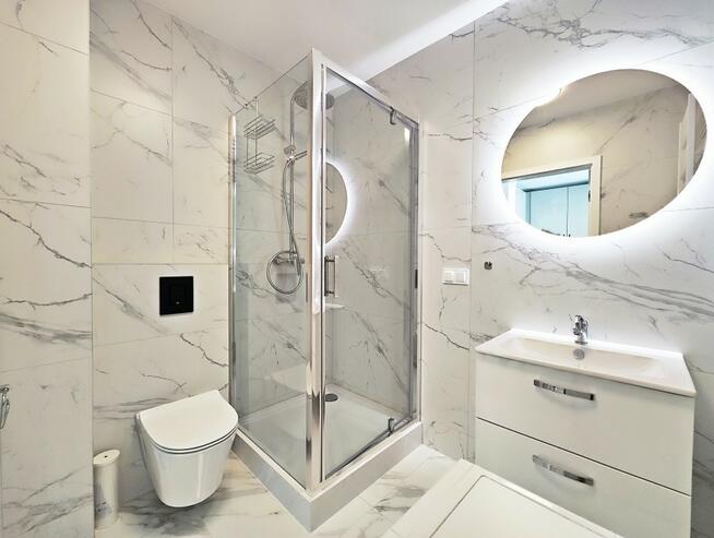 Nowy apartament z balkonem oraz garażem