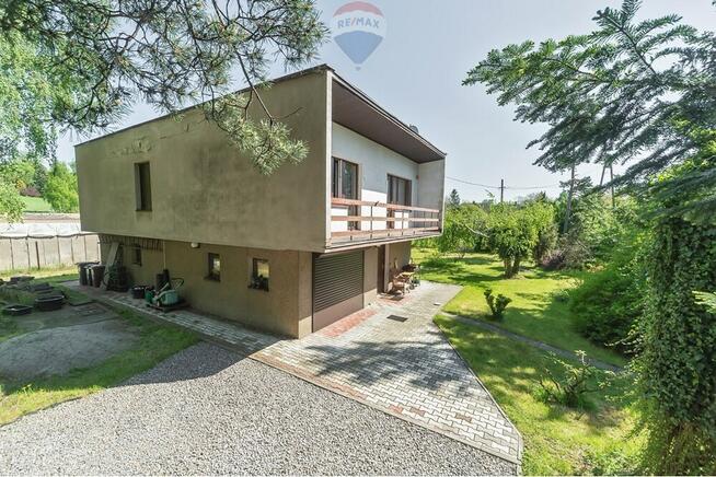 Dom lub biuro z dużym ogrodem w centrum Komorowic