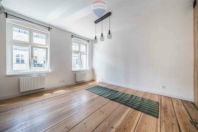 Ładna kawalerka kamienica winda Stare Miasto