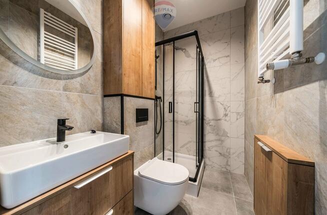 Ładna kawalerka kamienica winda Stare Miasto