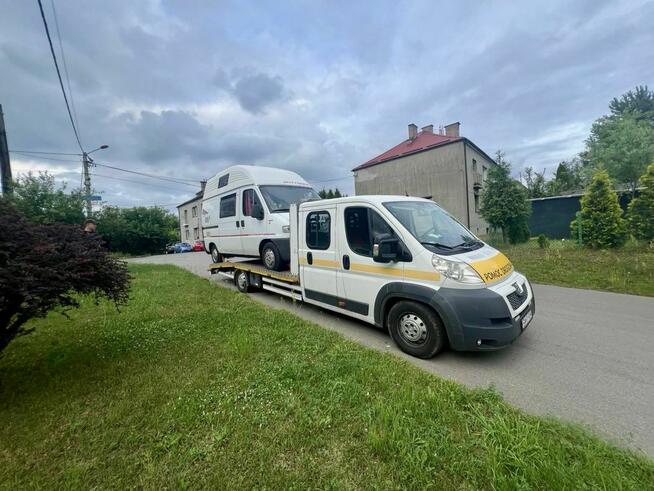 Pomoc drogowa laweta 24h autolaweta transport holowanie