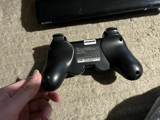 PlayStation 3 wraz z padem i grami