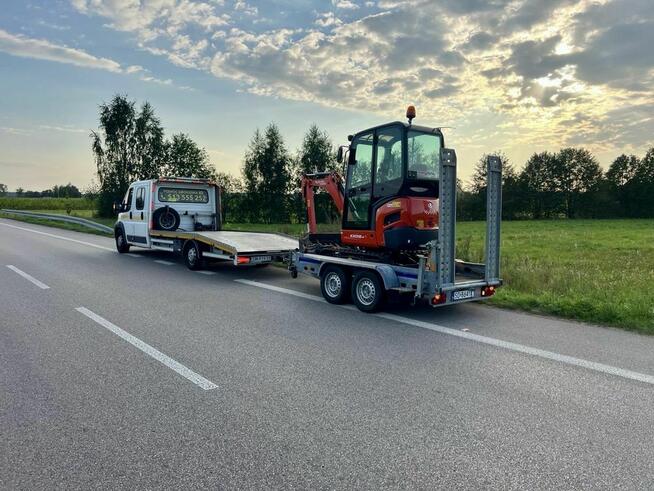 Pomoc drogowa laweta 24h autolaweta transport holowanie