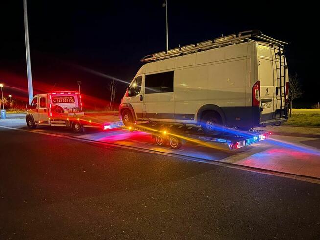 Autolaweta pomoc drogowa transport holowanie holownik tir