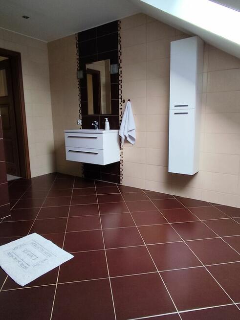 Dom dwurodzinny z garażami i dużą działką