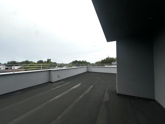 Dwupoziomowy apartament z tarasem – Platanove