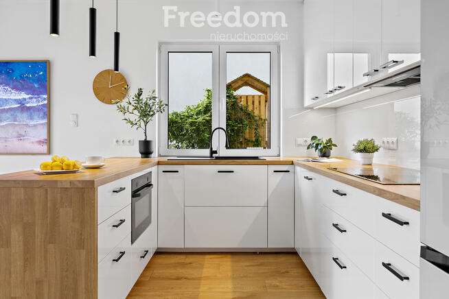 Nowoczesny segment z ogrodem i dużym poddaszem