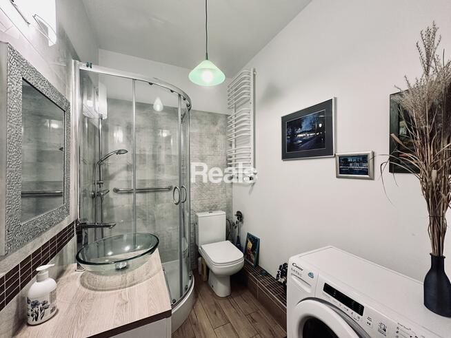 Kawalerka z dużym ogrodem niedaleko lasu.