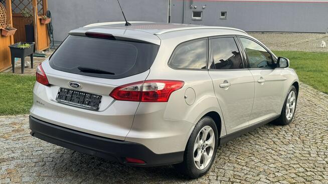 Ford Focus 1.6 Benzyna 125KM z Niemiec, serwisowany + koła zimowe! Klimatronic.