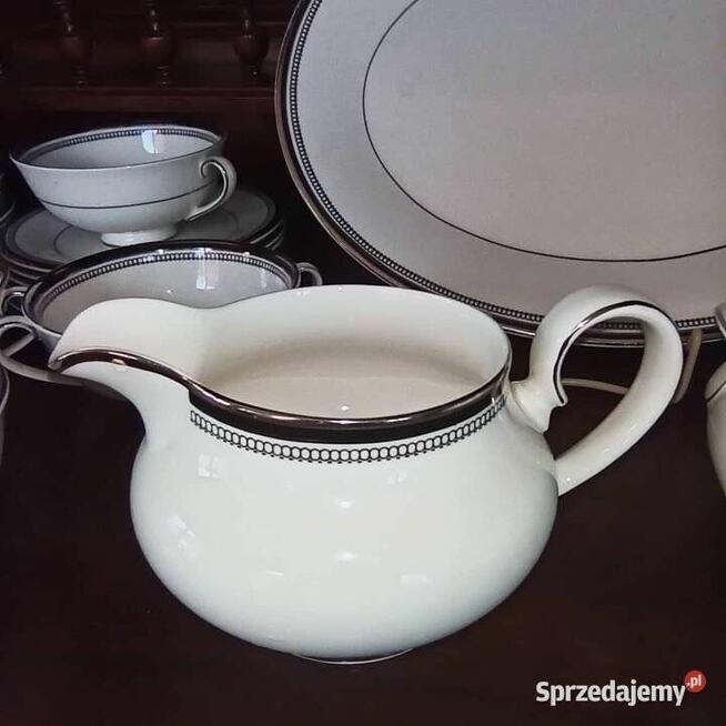 Filiżanka z talerzykiem deserowym. Syg. SARABANDE. Royal Dou