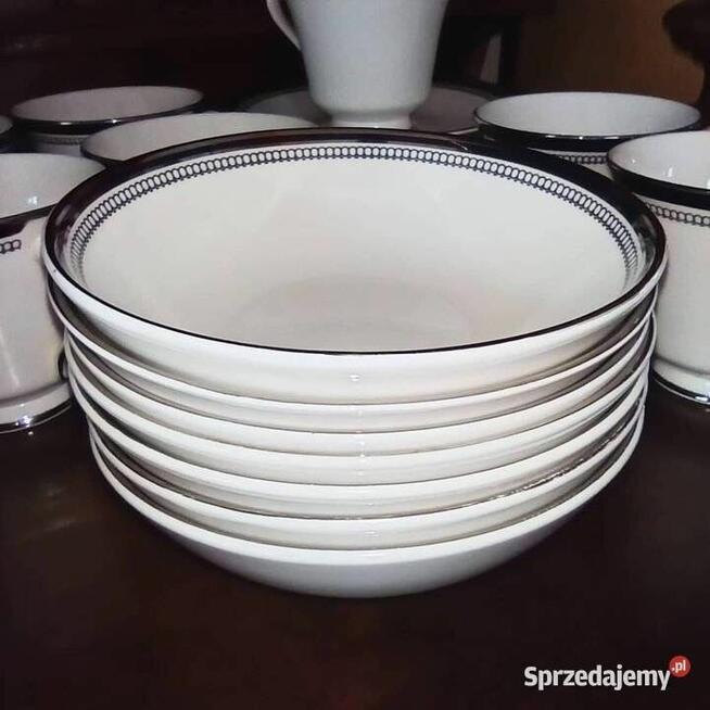 Filiżanka z talerzykiem deserowym. Syg. SARABANDE. Royal Dou