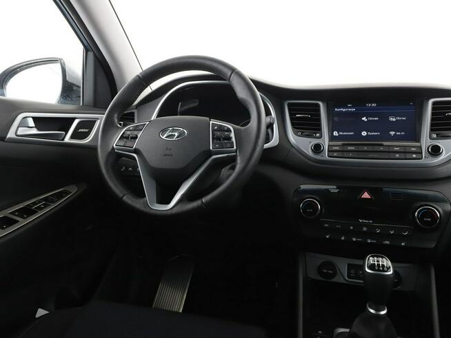Hyundai Tucson Navi Czujniki parkowania Klimatyzacja Podgrzewane fotele Bluetooth