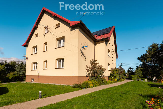 Przytulne mieszkanie z ogrodem, garażem i piwnicą