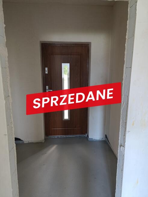 Nowy dom parterowy 128 m2 / 10,50 ara