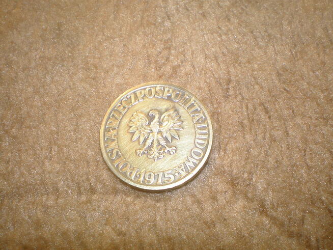 Sprzedam monetę 5 zł z roku 1975,używana, stan dobry.