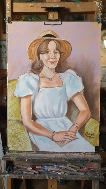 Maluje obrazy i kopie, rysuje portrety i karykatury ze zdjec