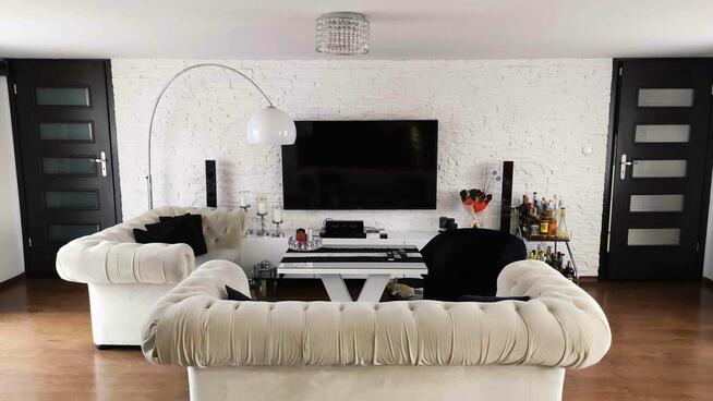 Sprzedam dom wraz z dwoma lokalami użytkowo -handlowymi.