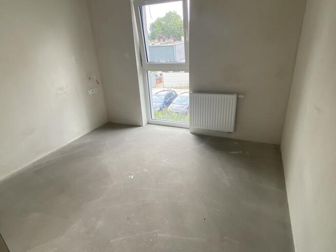 Mieszkanie w nowym bloku przy ulicy Rynkowej.