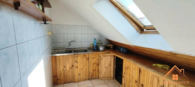 dwa mieszkania z garażami