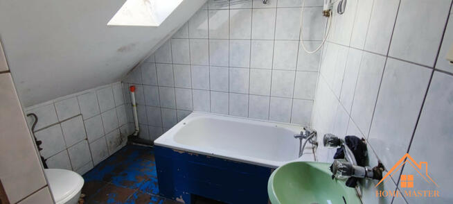 dwa mieszkania z garażami