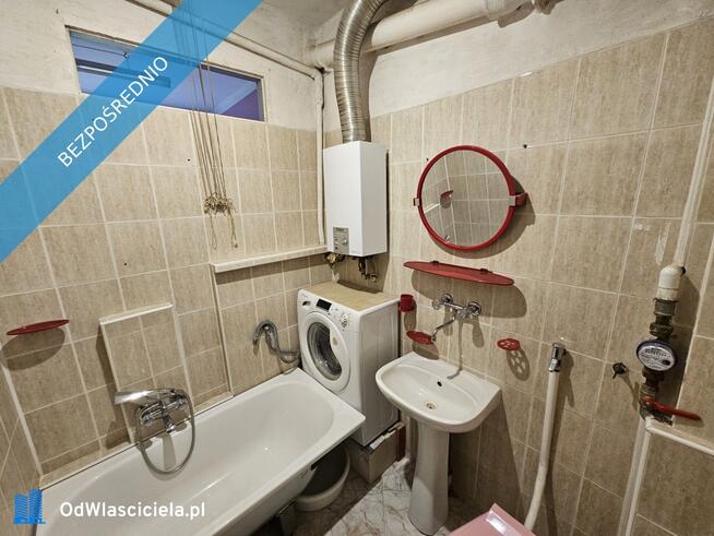 Przestronna kawalerka 37 m² z widokiem na park, w cichym bloku z cegły.