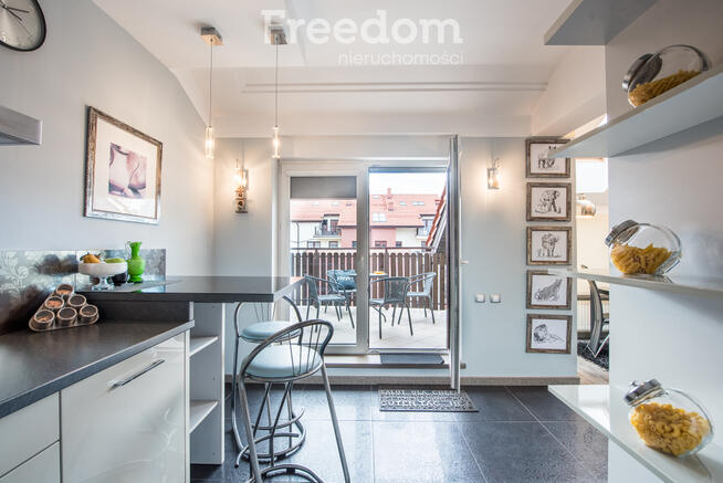 Dwupoziomowy apartament z tarasem - Osiedle Ptasie