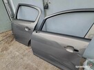 Opel Corsa D drzwi lewe przód, tył. z40w - 4